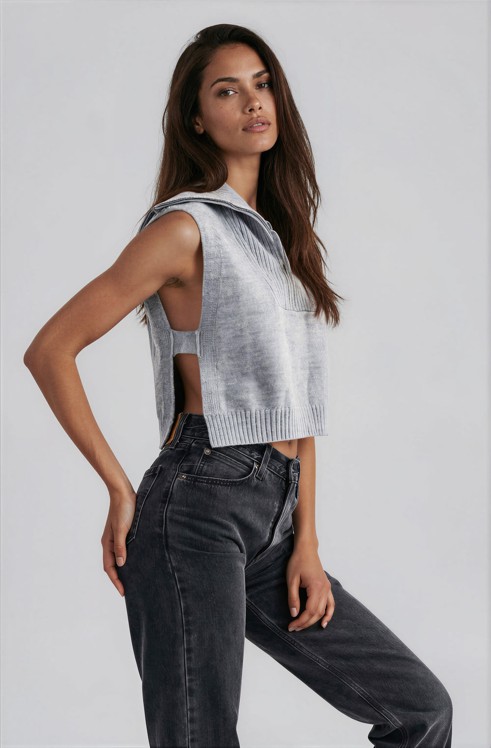 grey sleeveless sweater top with side cutouts and collar
