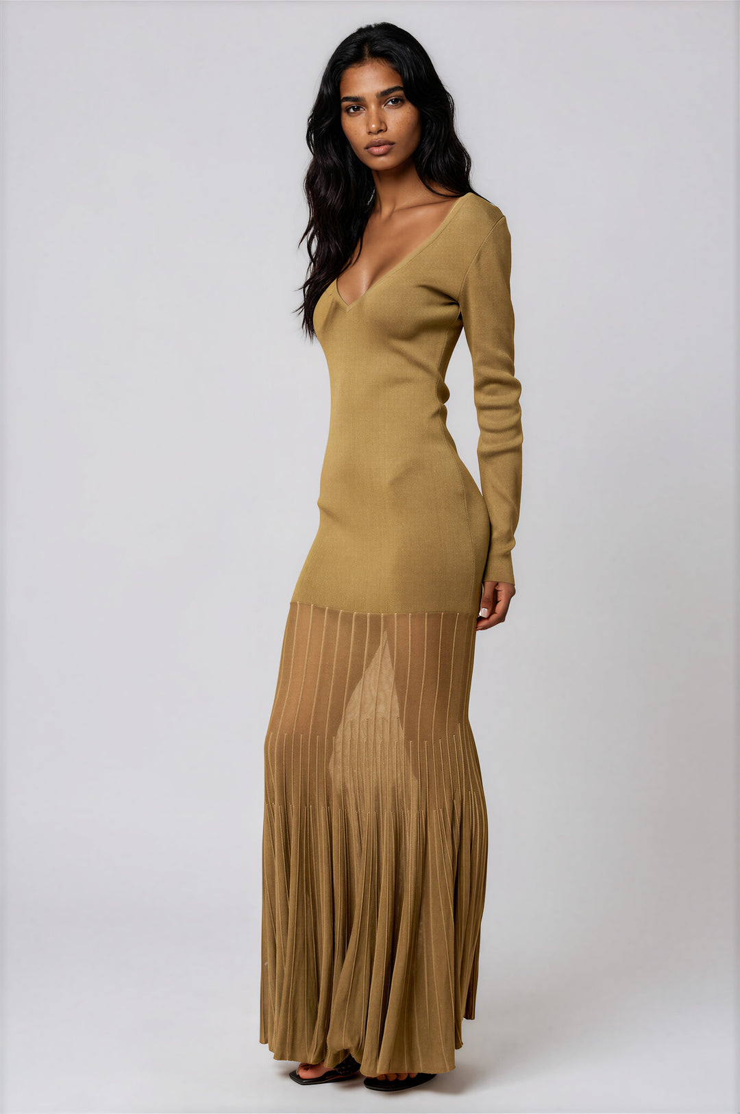 Olive knit long-sleeve maxi dress with a fitted body and sheer pleated fishtail hem, back view
