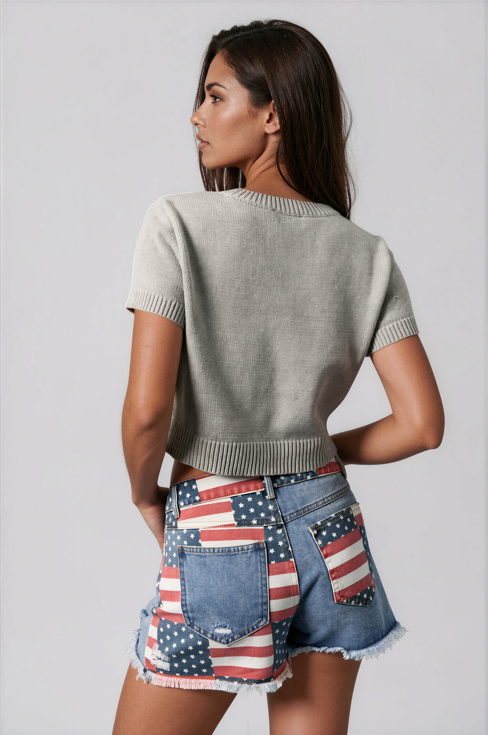 woman wearing gray sweater with dog graphic
