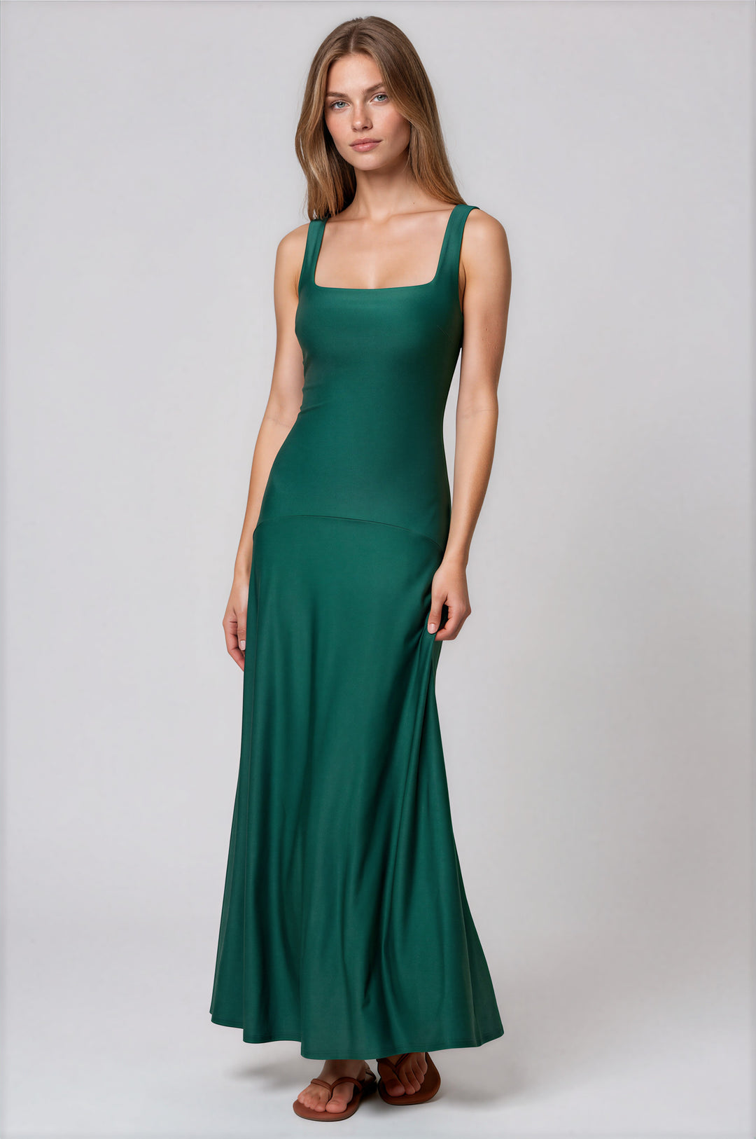 Deep green square-neck maxi dress with a drop waist and fit-and-flare skirt, front view #color_green