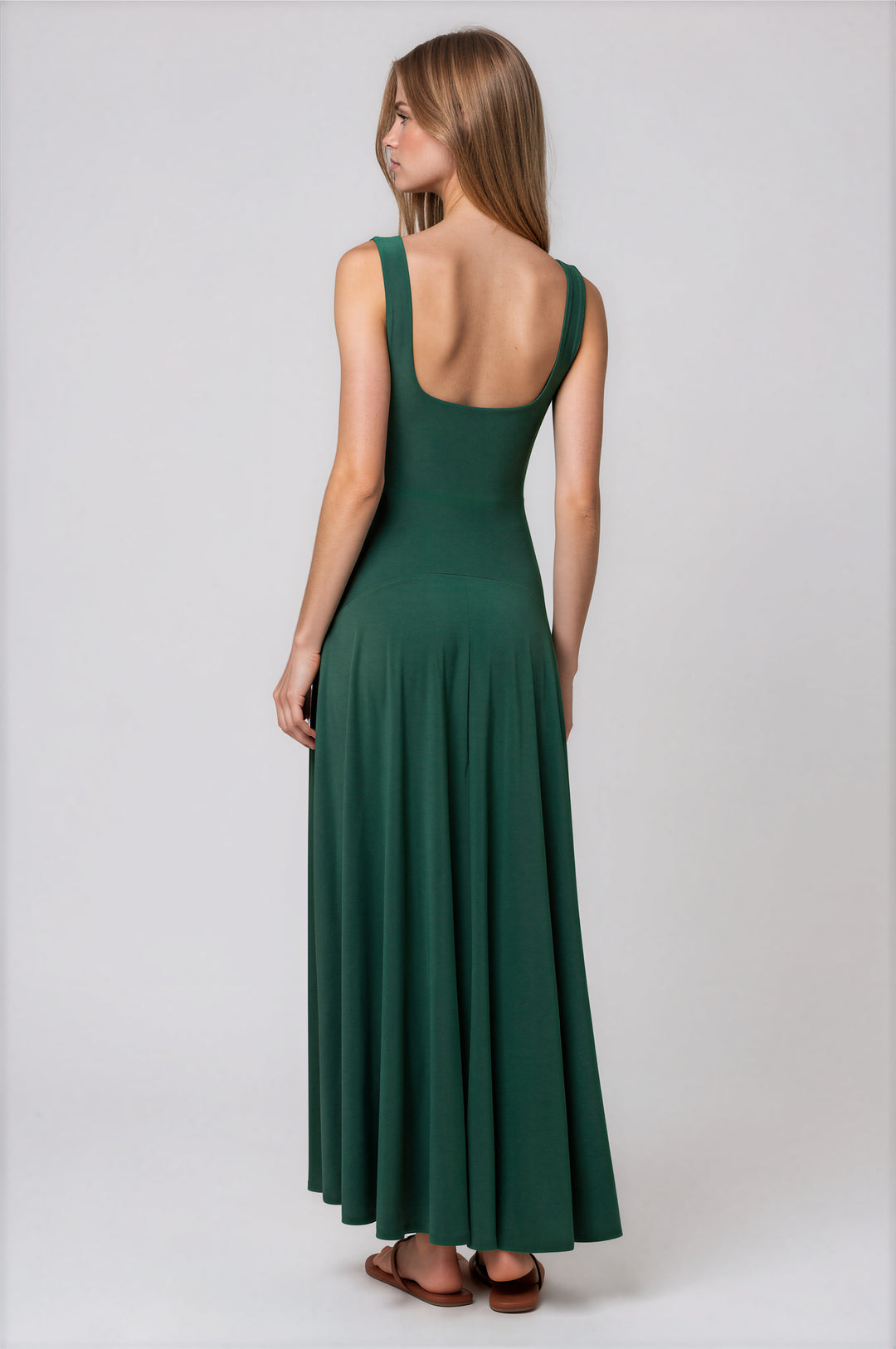 Deep green square-neck sleeveless maxi dress with a flared floor-length skirt #color_green