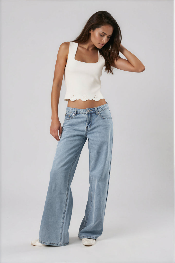 woman wearing white square neck tank top with scalloped trim