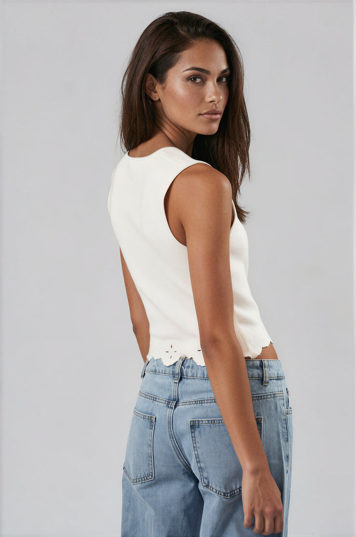 woman wearing white square neck tank top with scalloped trim