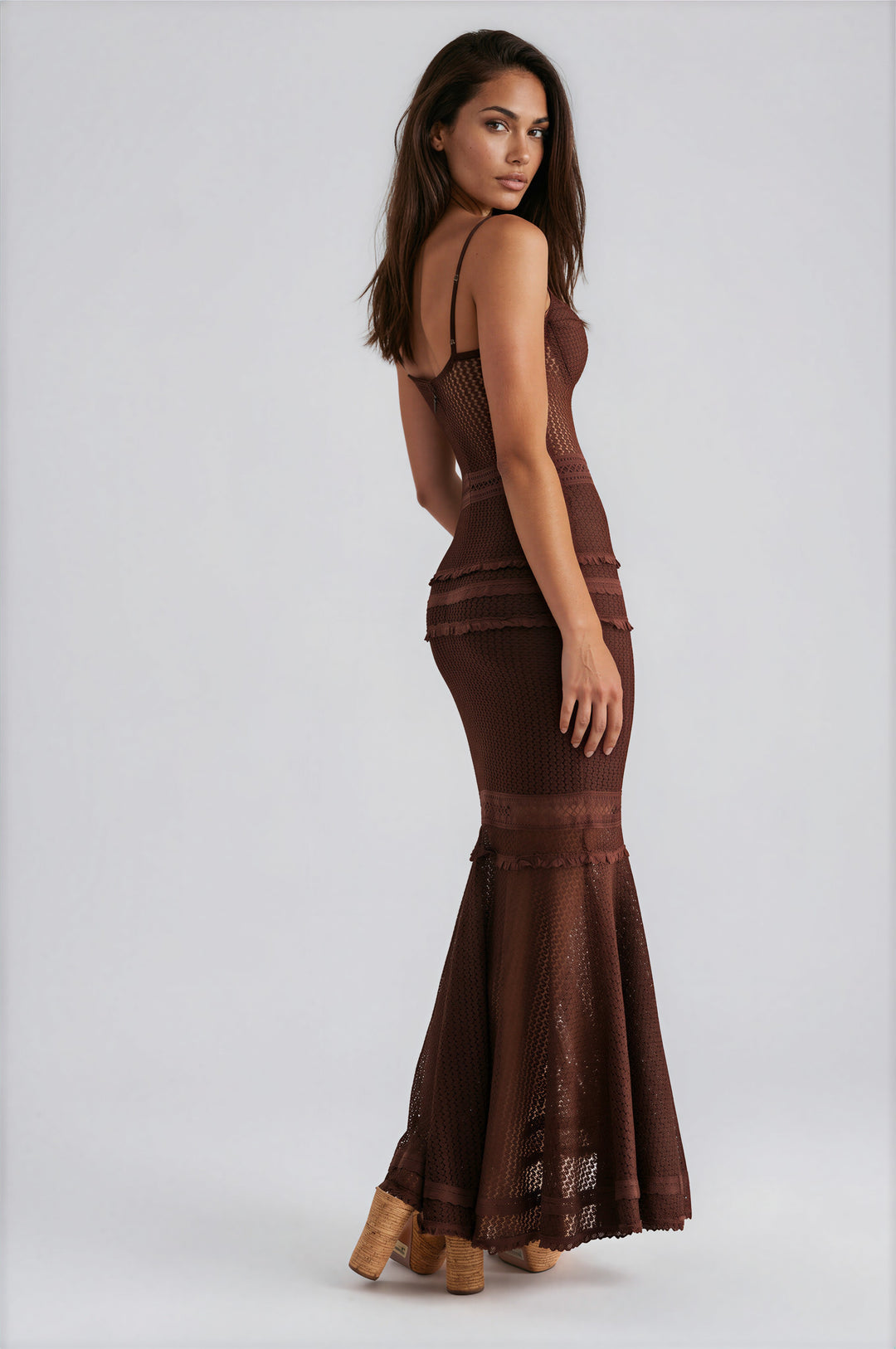 Brown crochet knit mermaid maxi dress with adjustable straps and flared hem