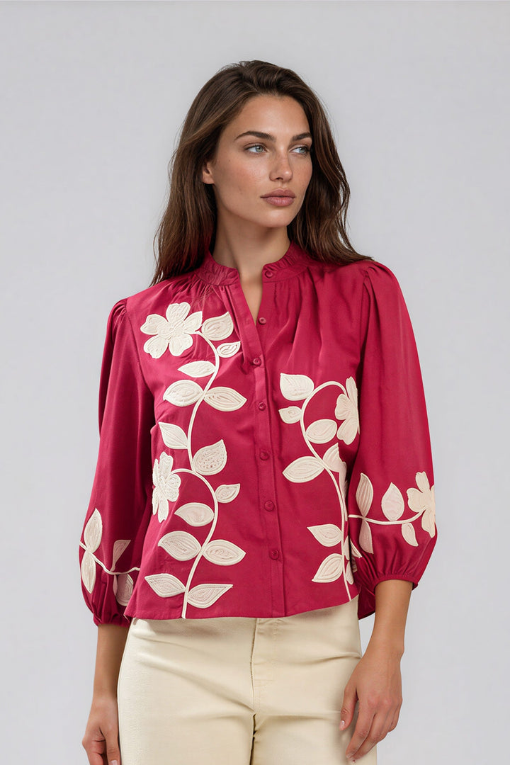 pink cotton blouse with white floral detail