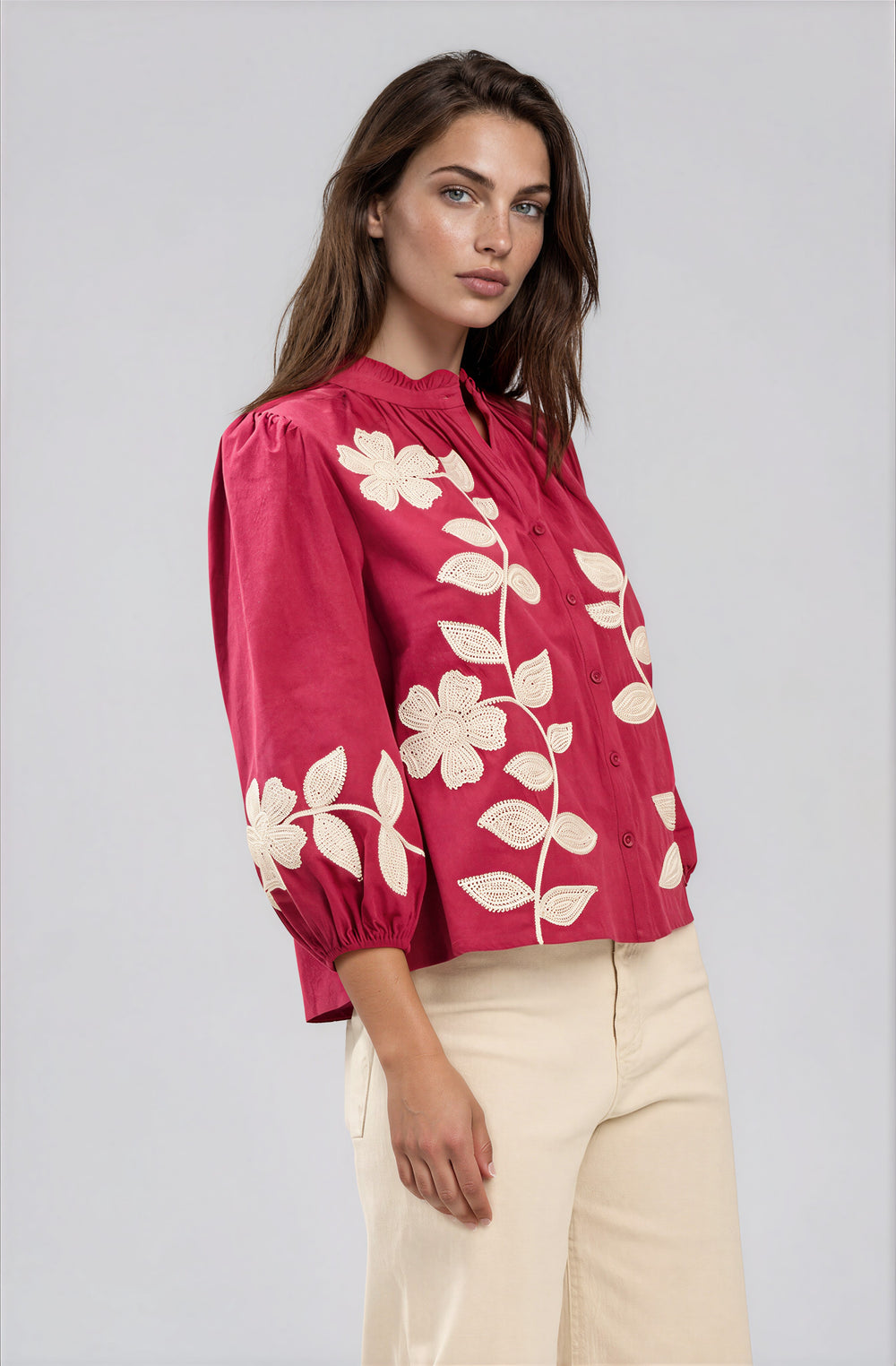pink cotton blouse with white floral detail
