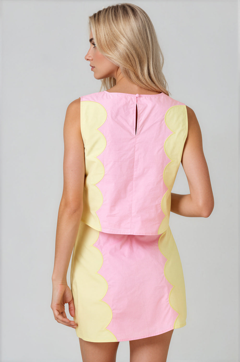 Pink color block skirt set with yellow scalloped contrast panels