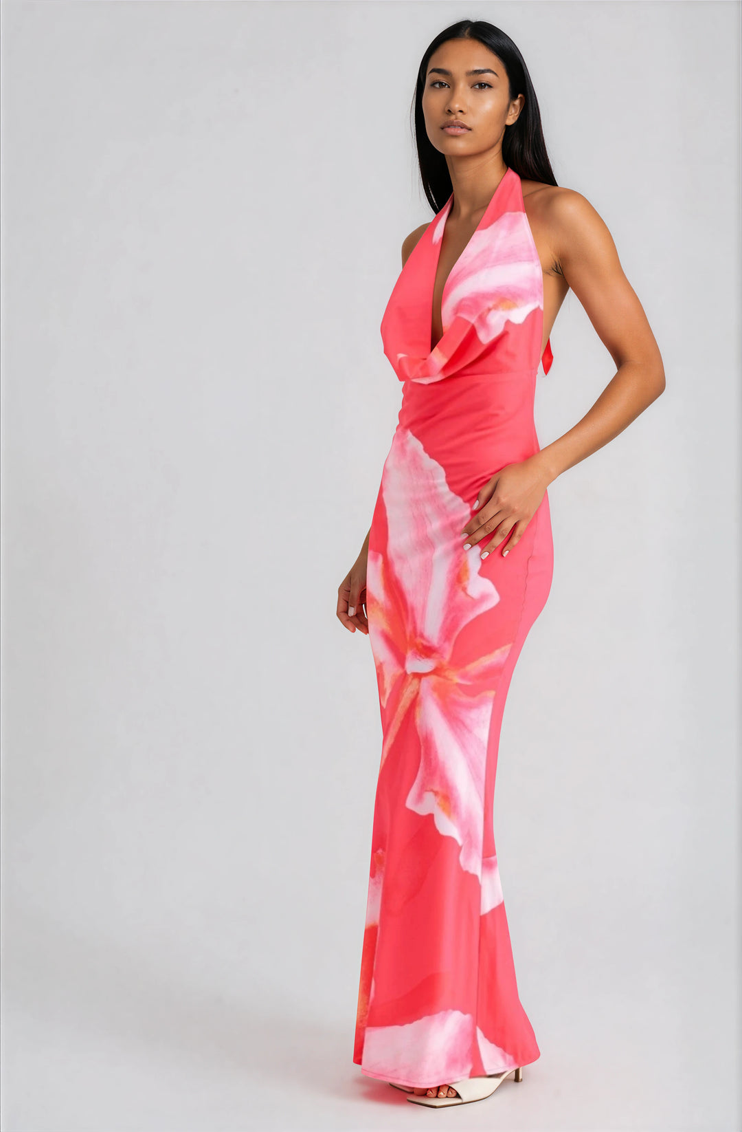 woman wearing pink floral halter maxi dress