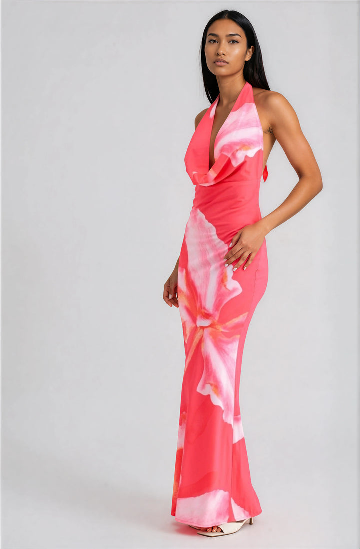 woman wearing pink floral halter maxi dress