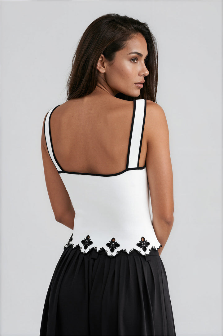 White knit tank top with scalloped floral cutout hem