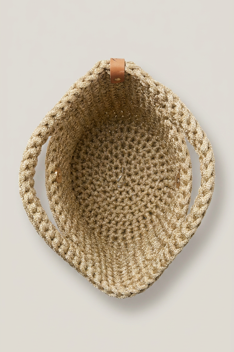 Twyla Gold Crochet Top Handle Bag, interior view of crocheted construction