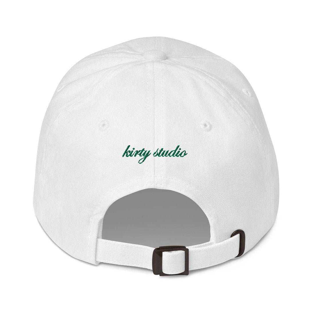 White cap with green text 'extra dirty extra olives' on a white background