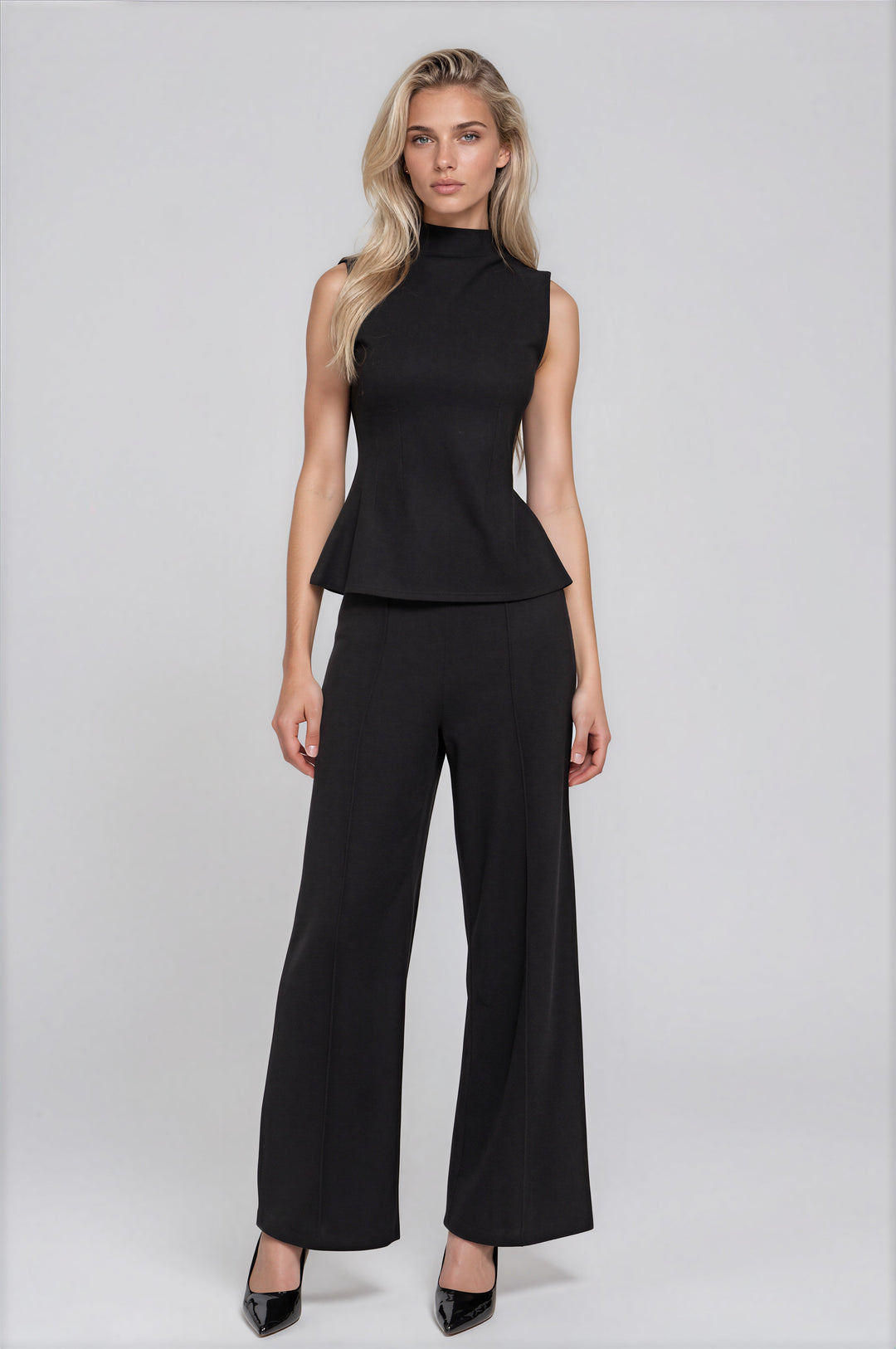 Black brushed rib set with a sleeveless high-neck top and straight-leg pants, front view
