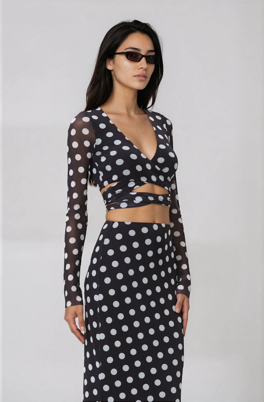 black and white polka dot mesh top with tie detail