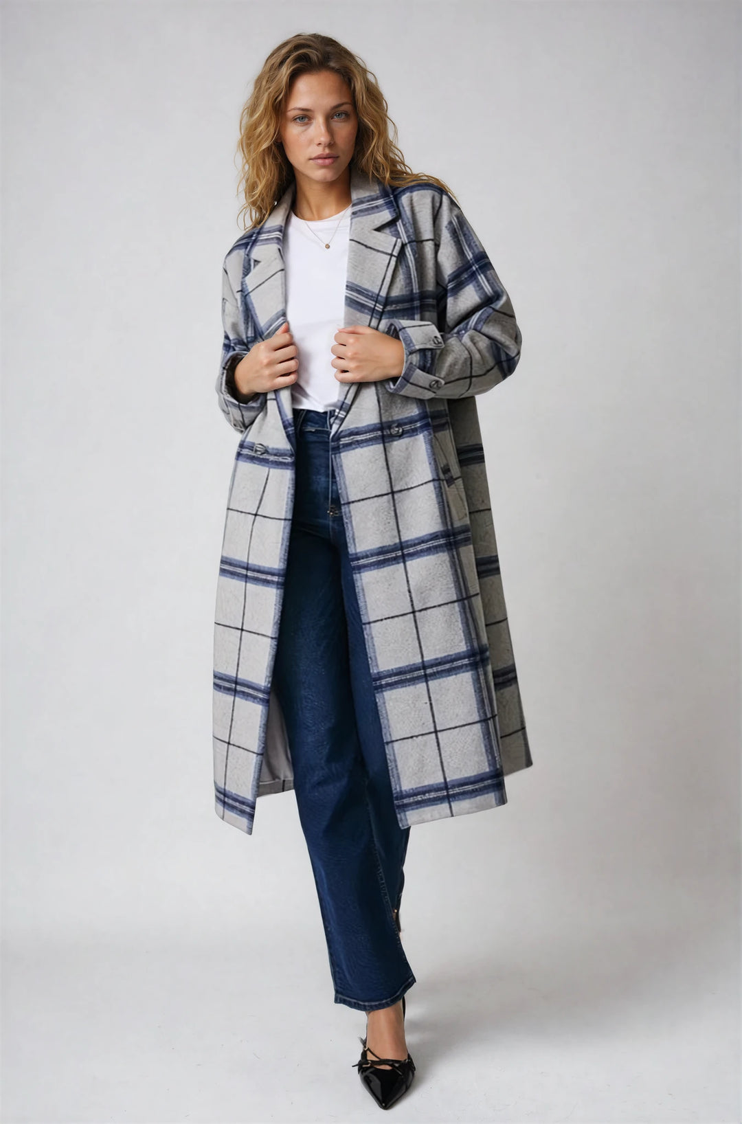 Blue longline plaid coat with tailored silhouette on model