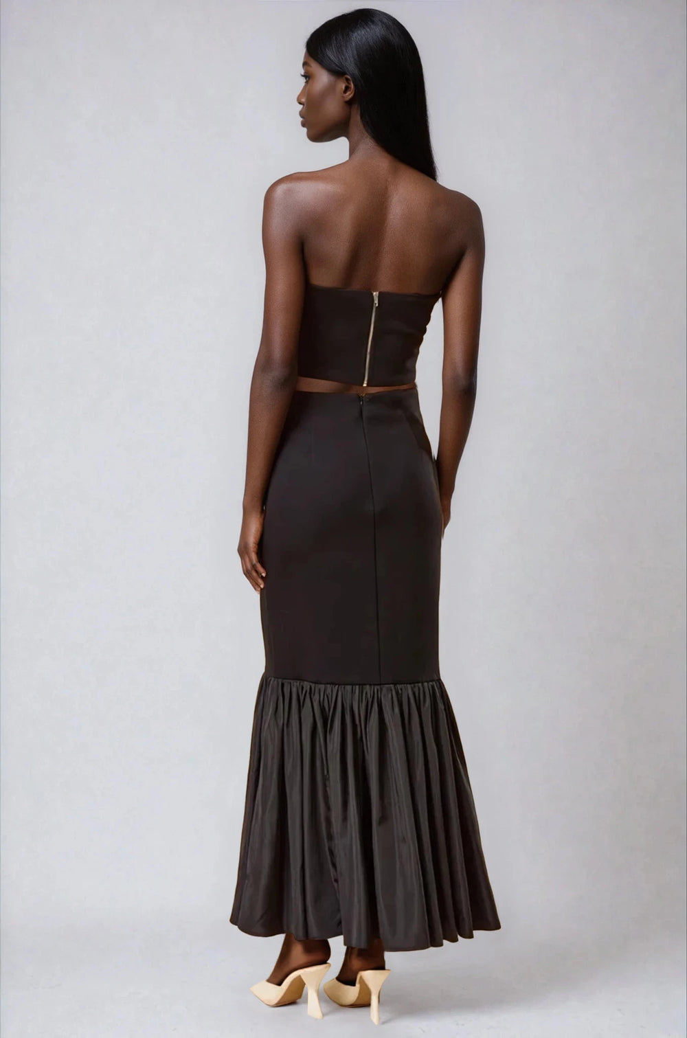 Back view black two piece formal set on model