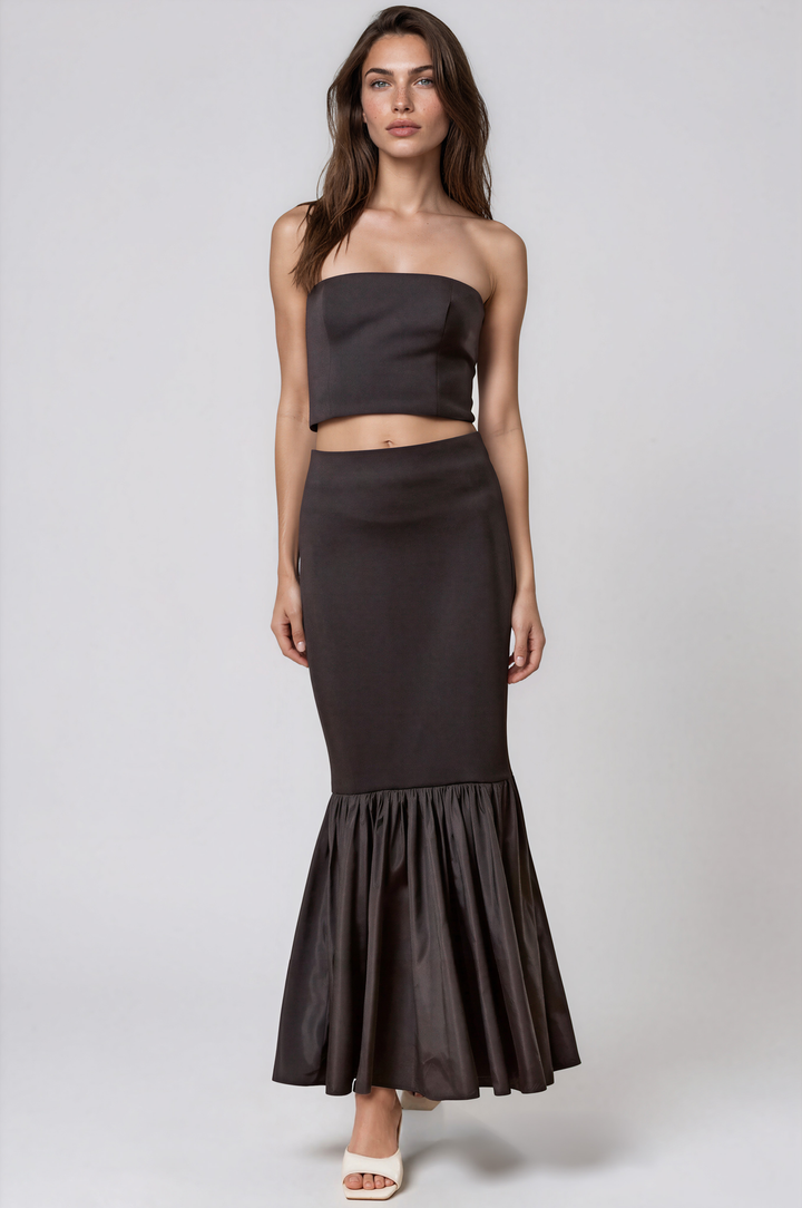 Black strapless two piece set with mermaid maxi skirt on model
