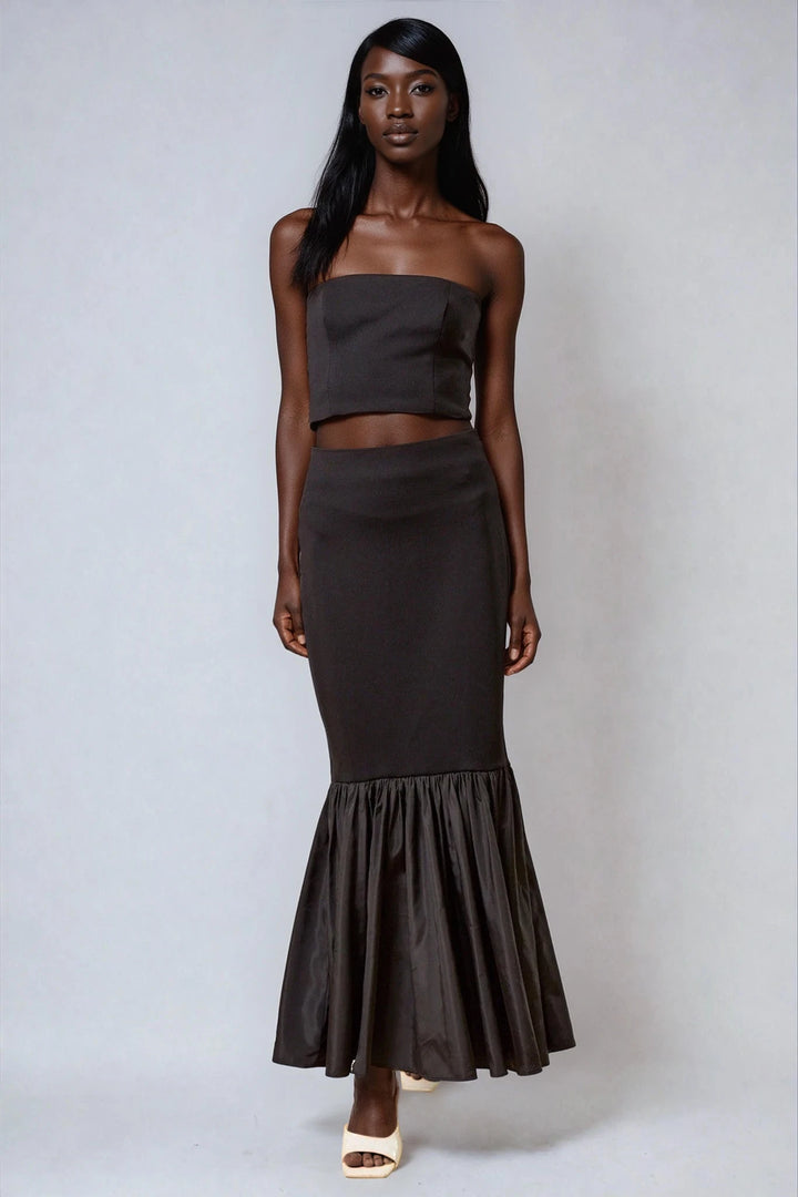 Black strapless two piece set with mermaid maxi skirt on model