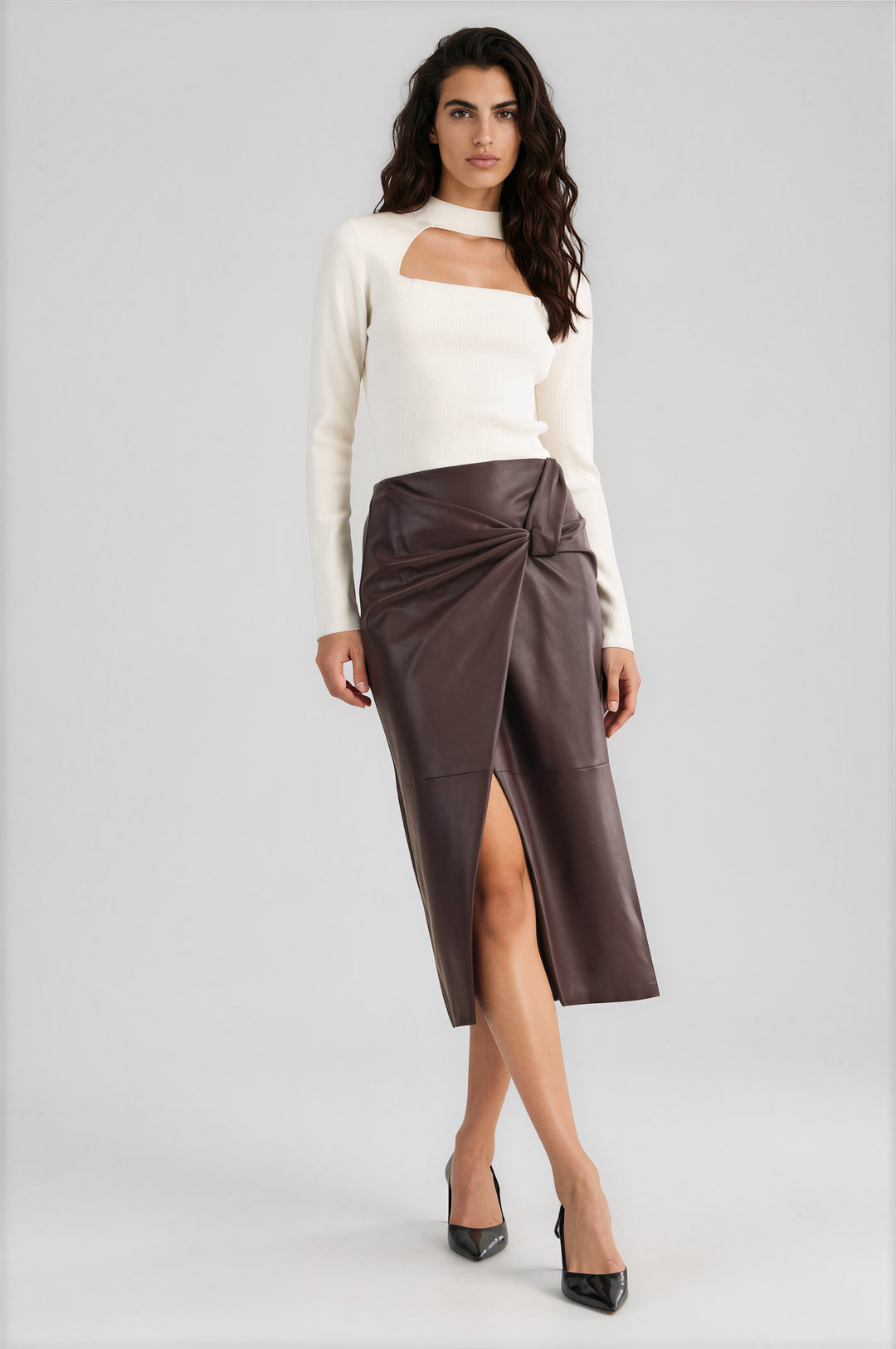 Brown vegan leather wrap skirt with a knot-front detail and high front slit, front view #color_brown