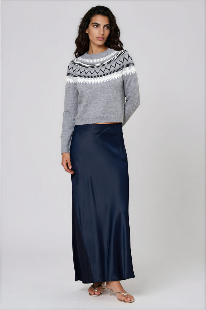 Gray patterned crewneck sweater with modern yoke on model