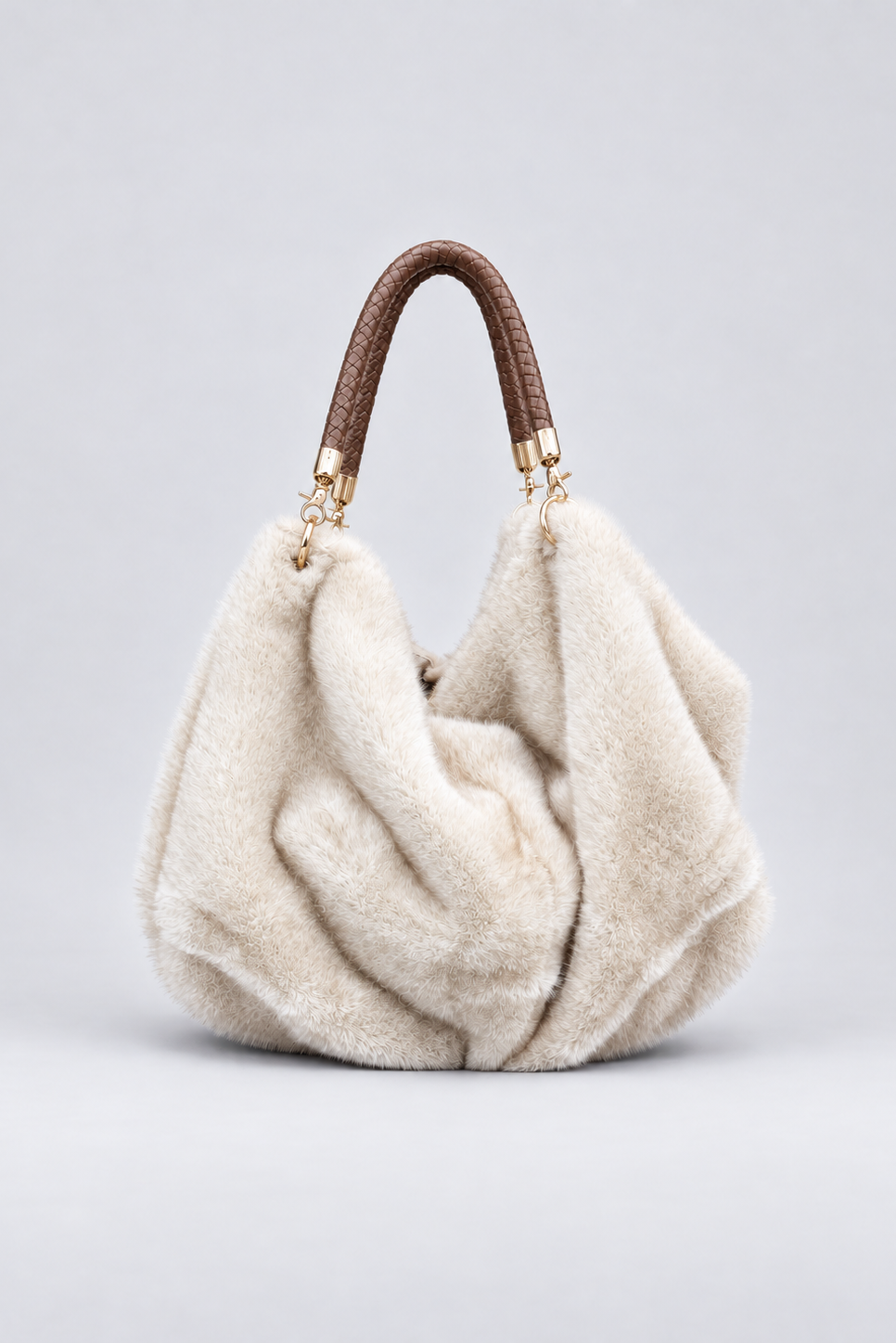 Off white faux fur clutch bag with a braided vegan-leather handle and gold-tone hardware