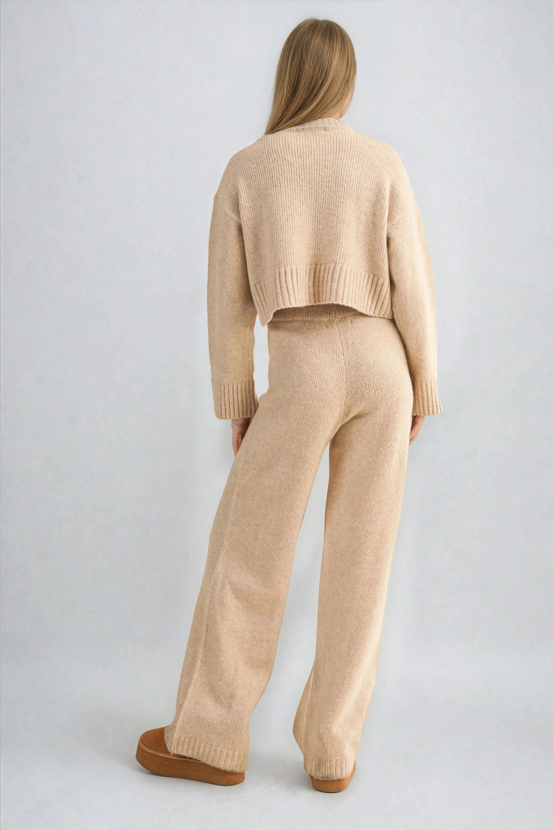 Back view beige knit sweater set on model