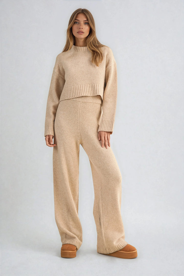 Beige knit sweater set with wide leg pants on model