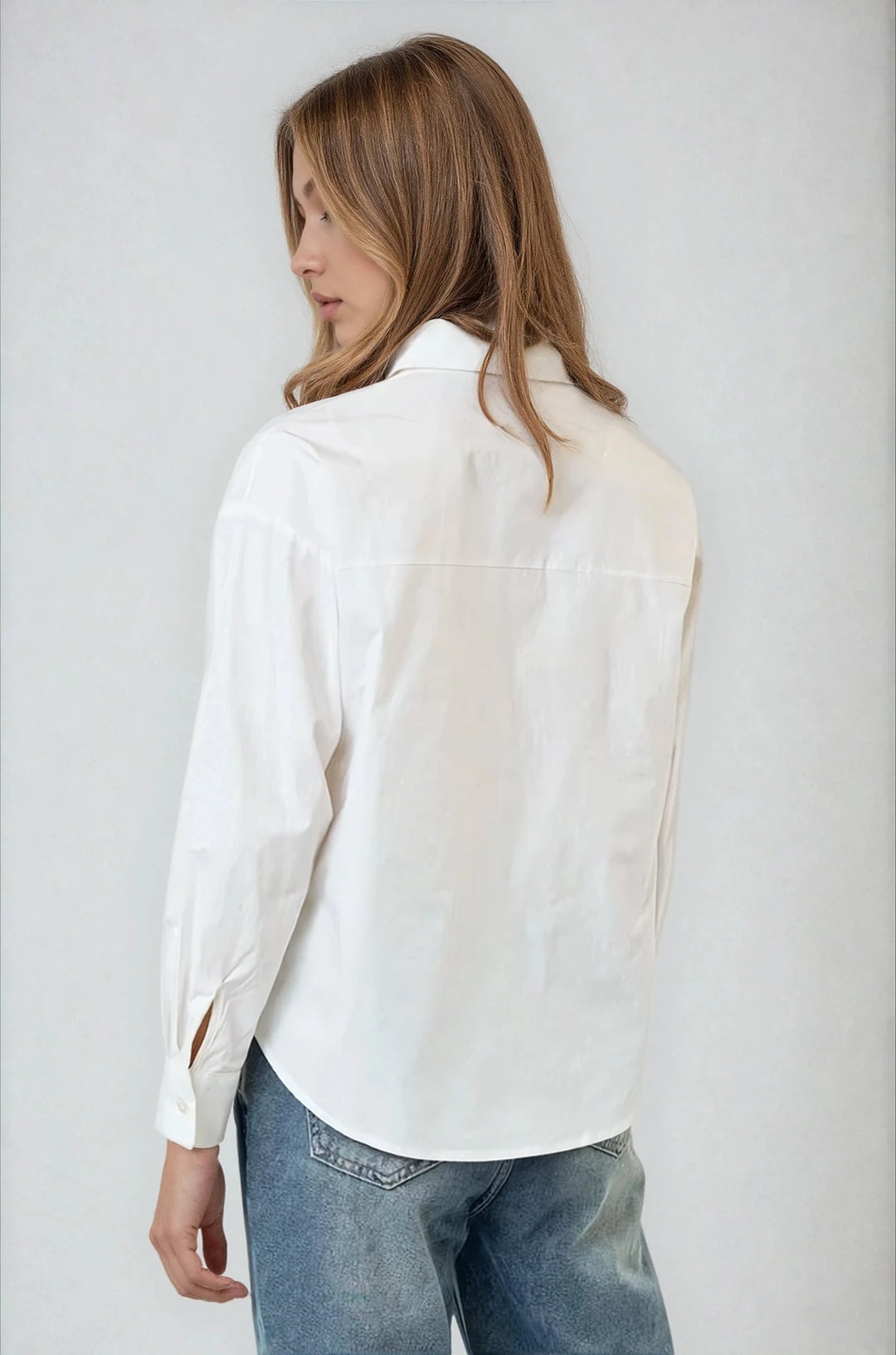 Back view off white collared cotton shirt on model