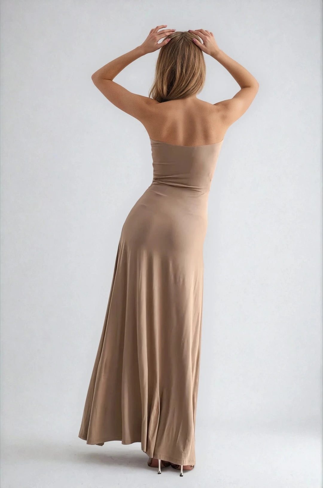 hannah gown on model beige back view flowing strapless gown