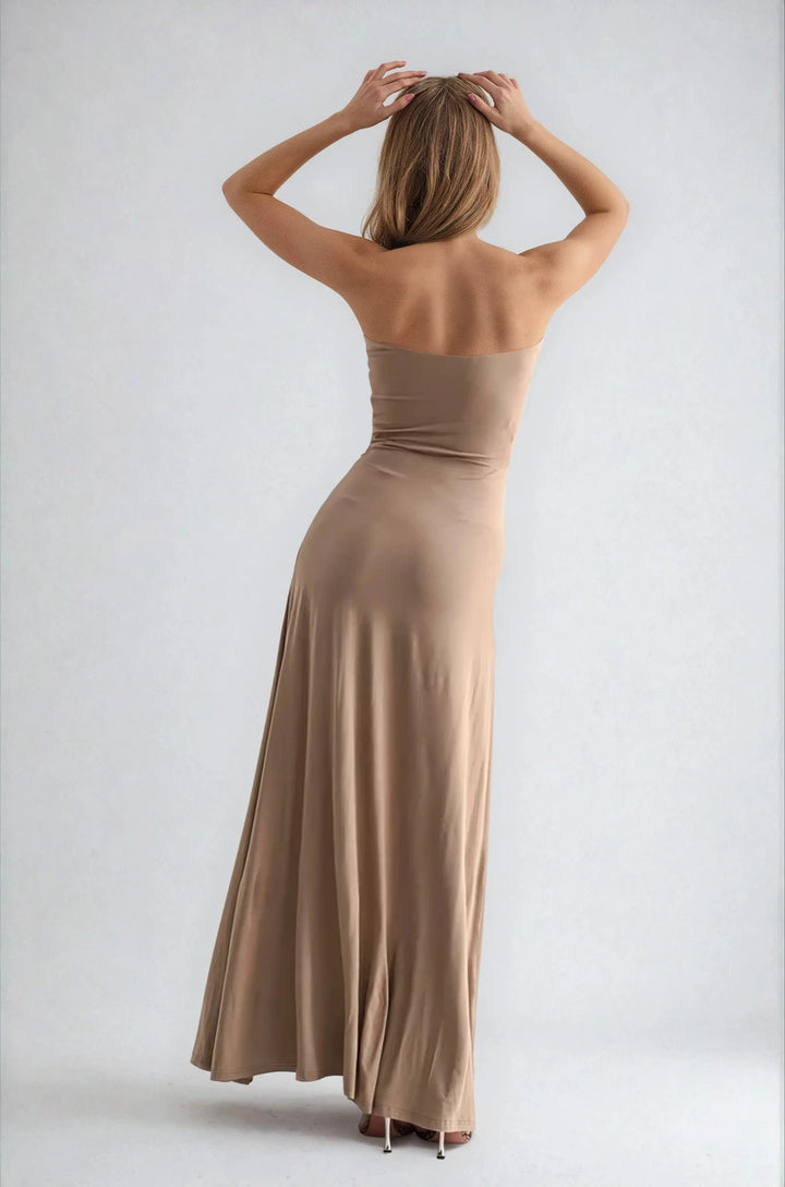 hannah gown on model beige back view flowing strapless gown