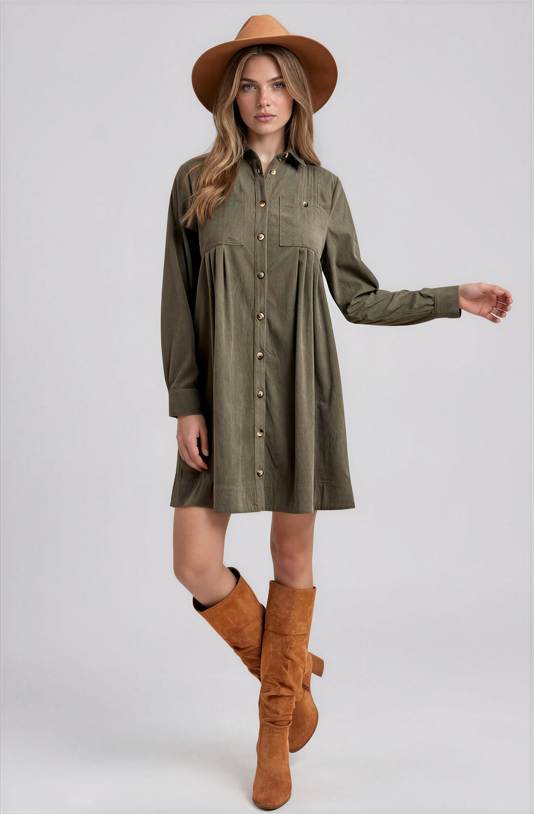 Olive corduroy mini shirt dress on model with boots