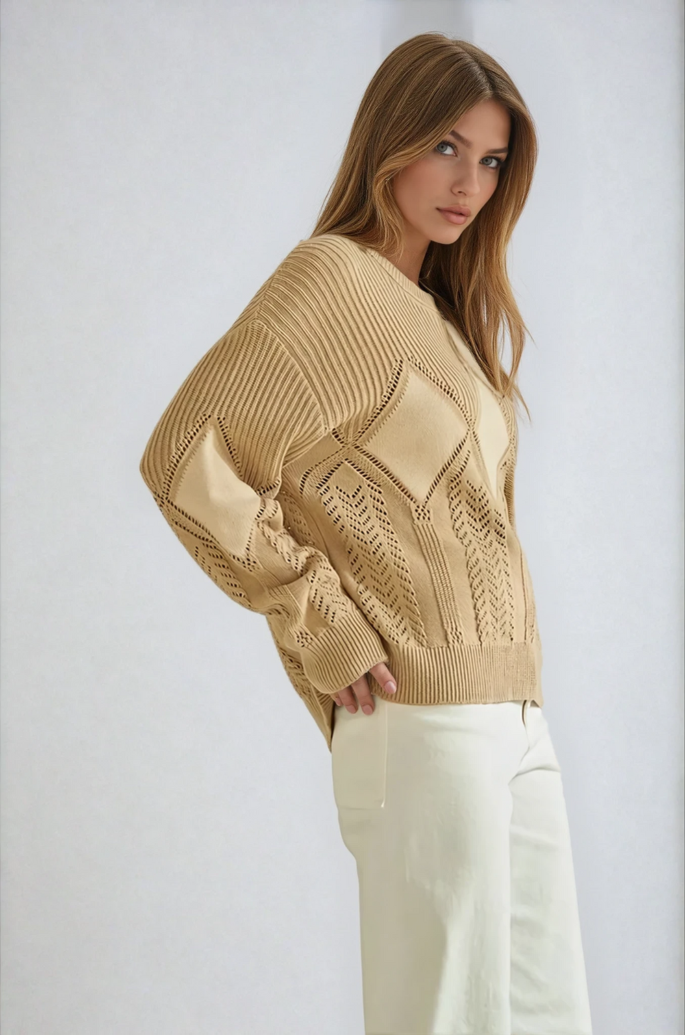 Side view beige relaxed fit sweater with dropped shoulders