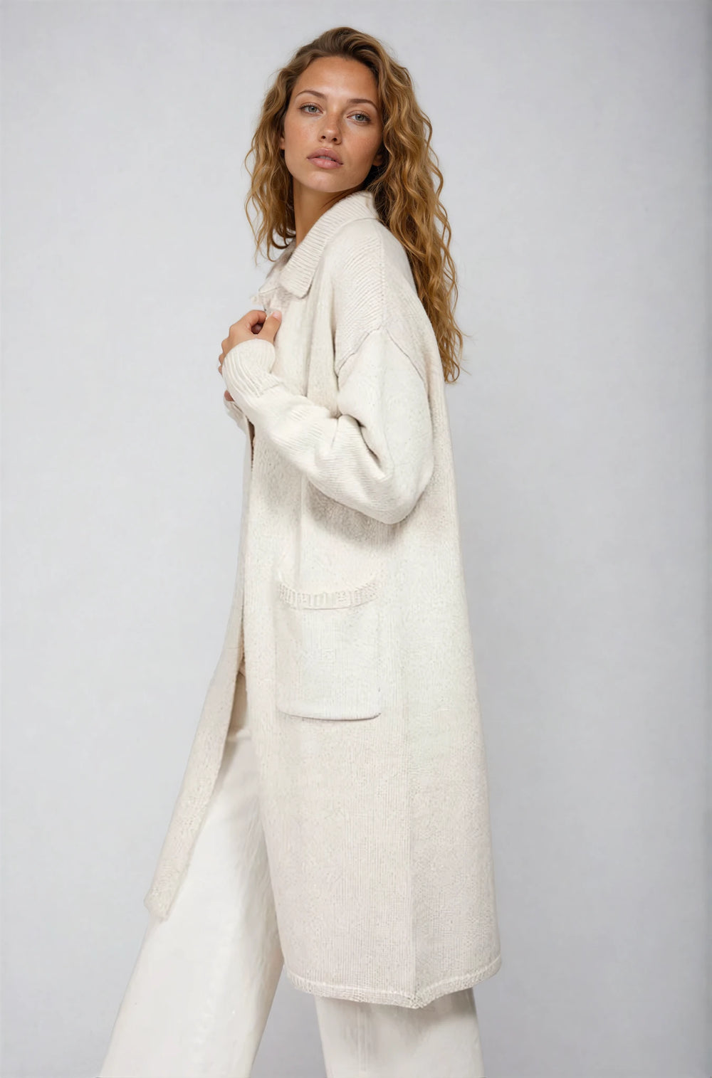 Back view black knit two piece set on model