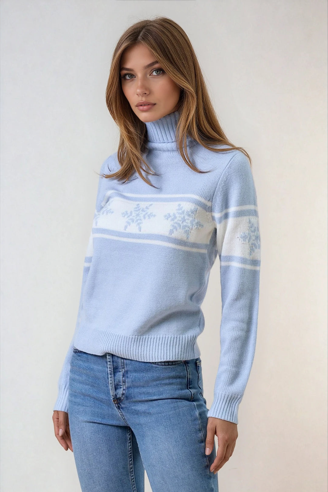 Light blue and ivory color block turtleneck sweater on model