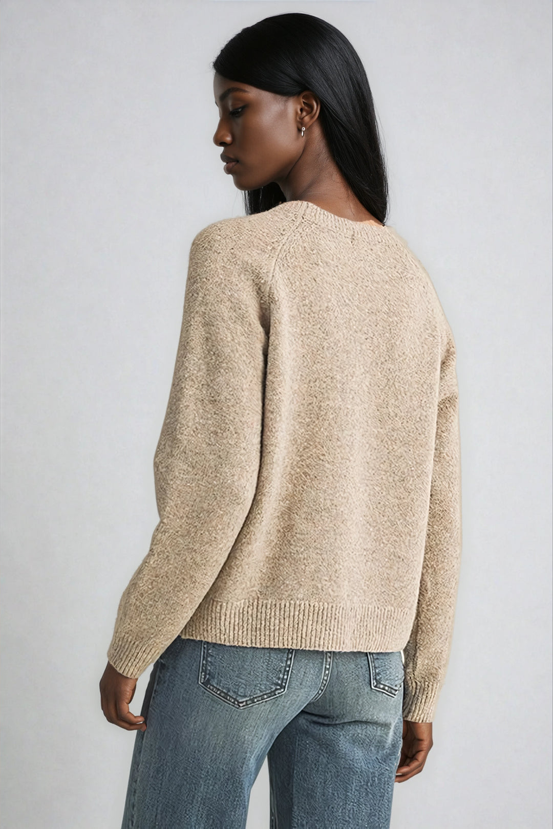 Back view beige knit sweater on model