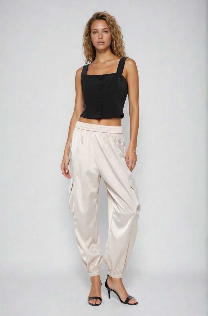 Side view off white sleeveless tweed top on model