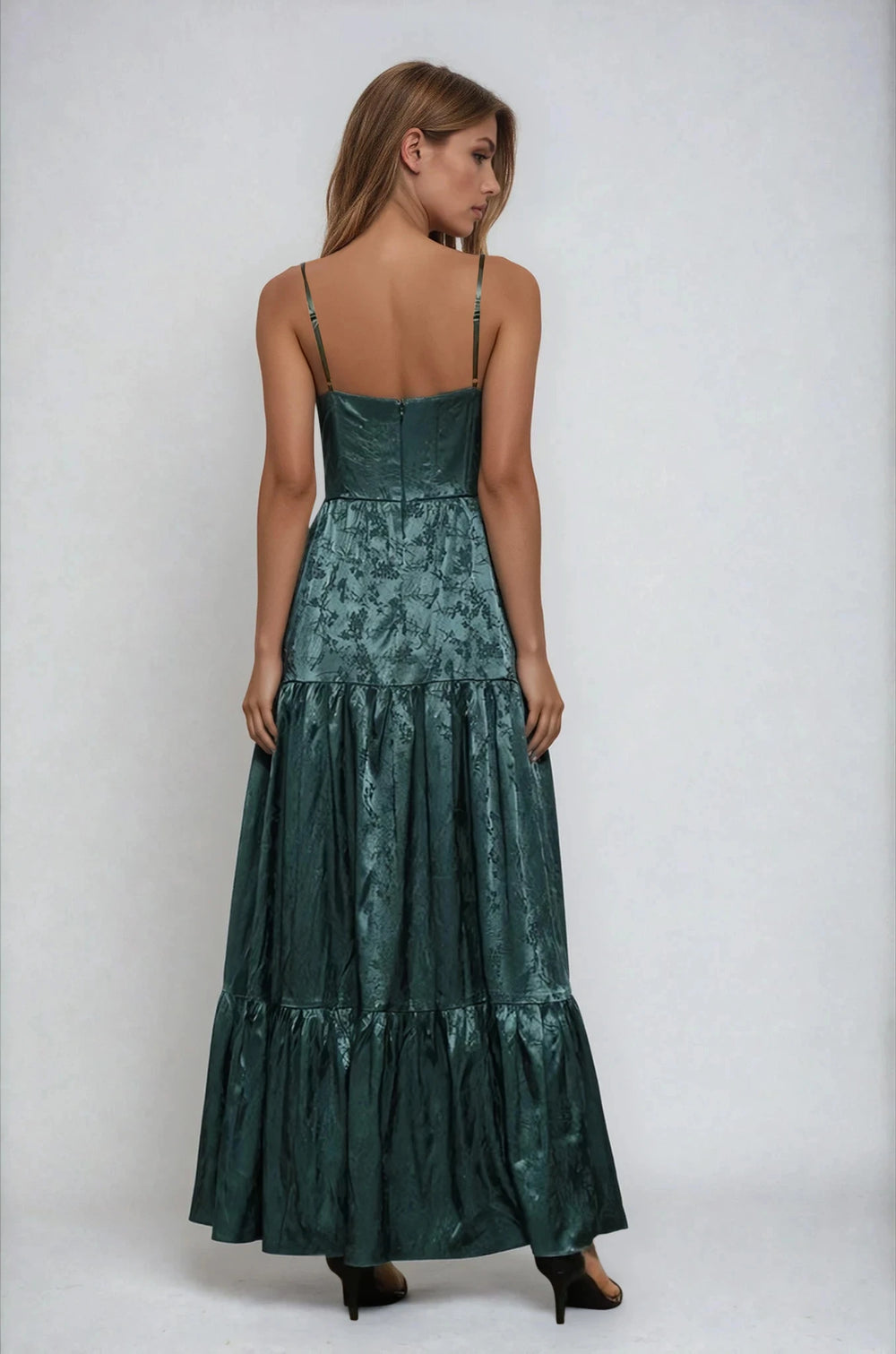 Back view dark green spaghetti strap maxi dress on model