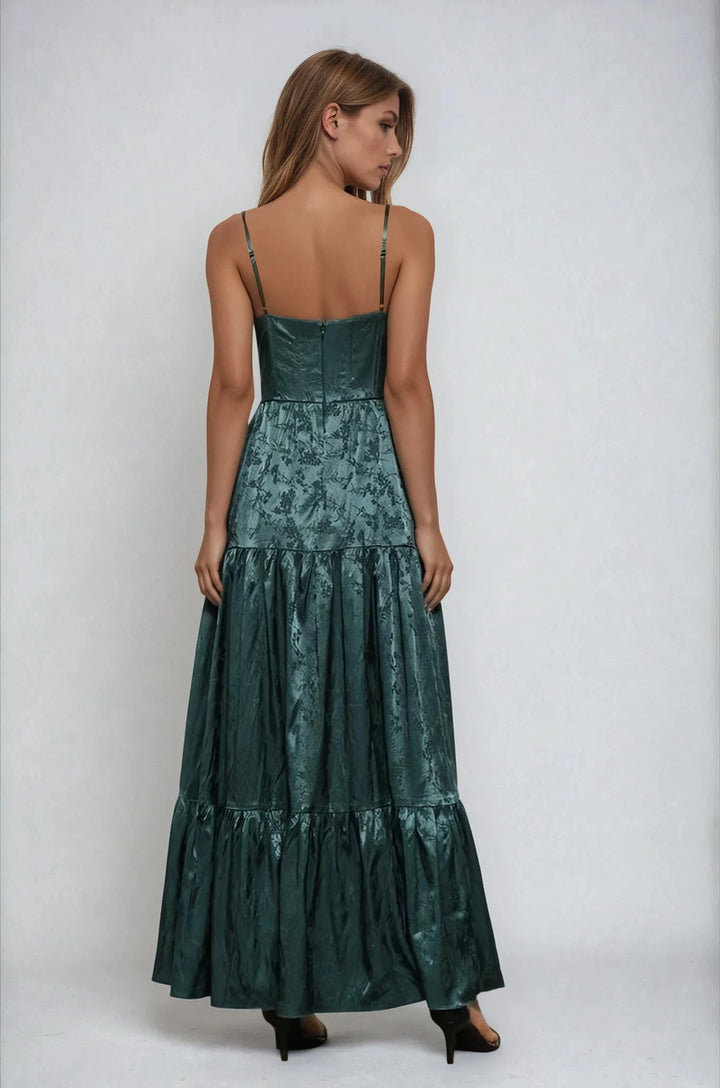 Back view dark green spaghetti strap maxi dress on model