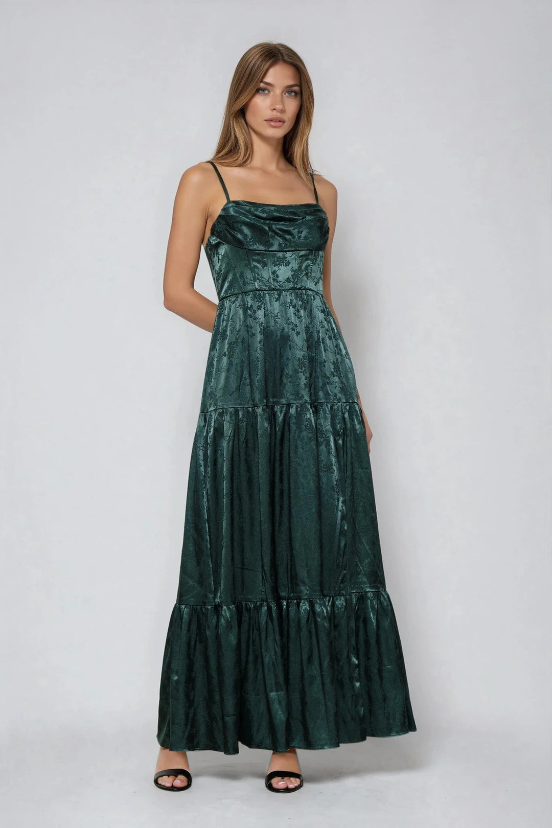 Dark green jacquard maxi dress with ruched bodice on model