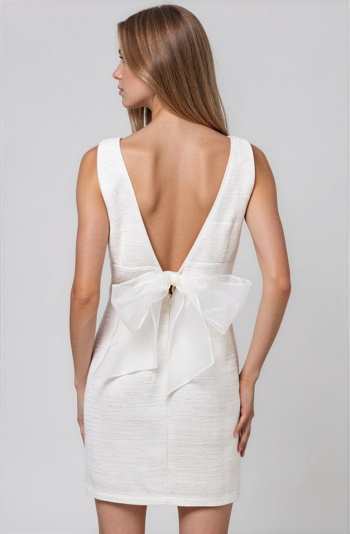white v neck mini dress with bow detail for bride back view