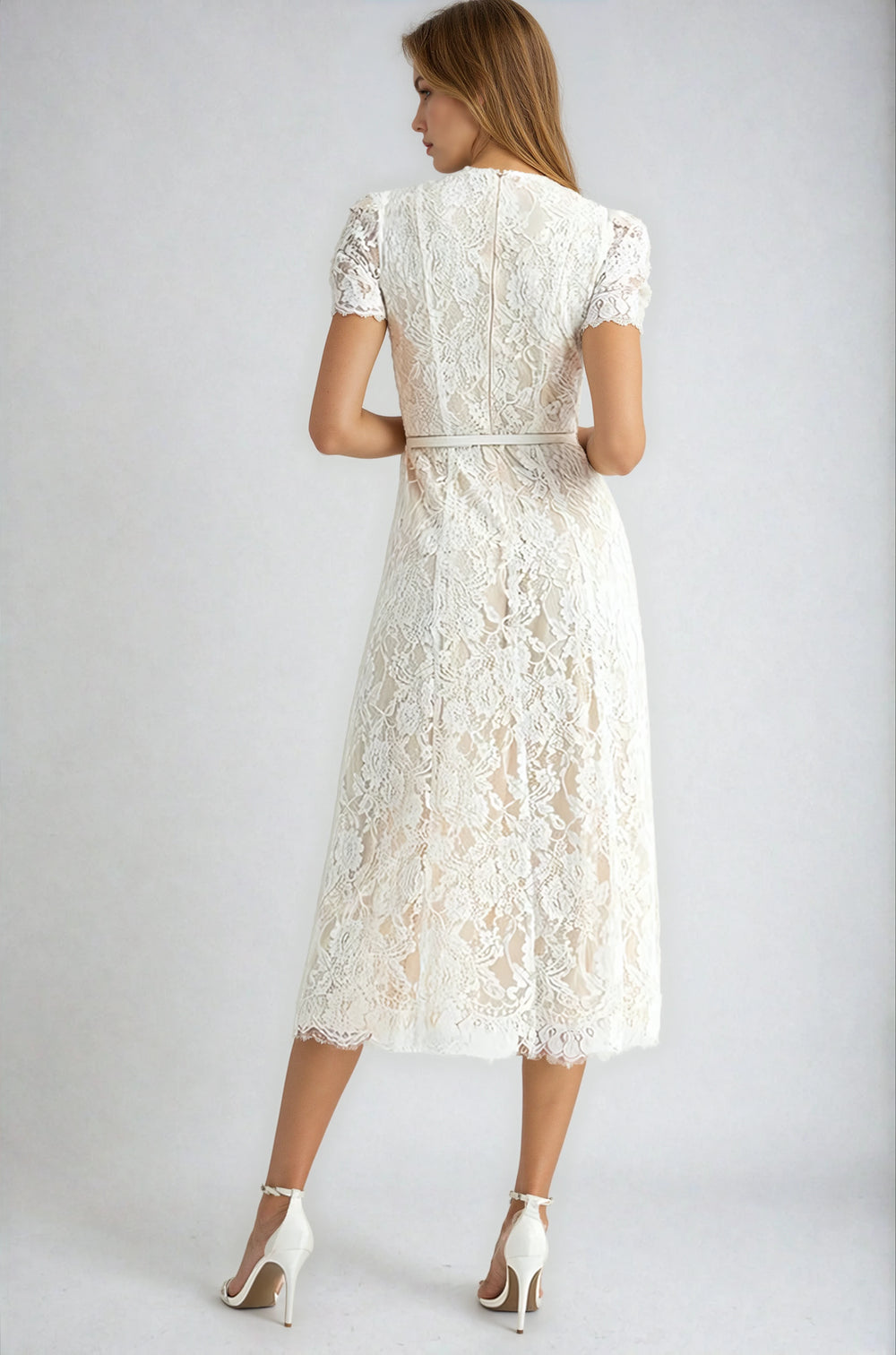 Back view ivory lace dress with waist belt on model