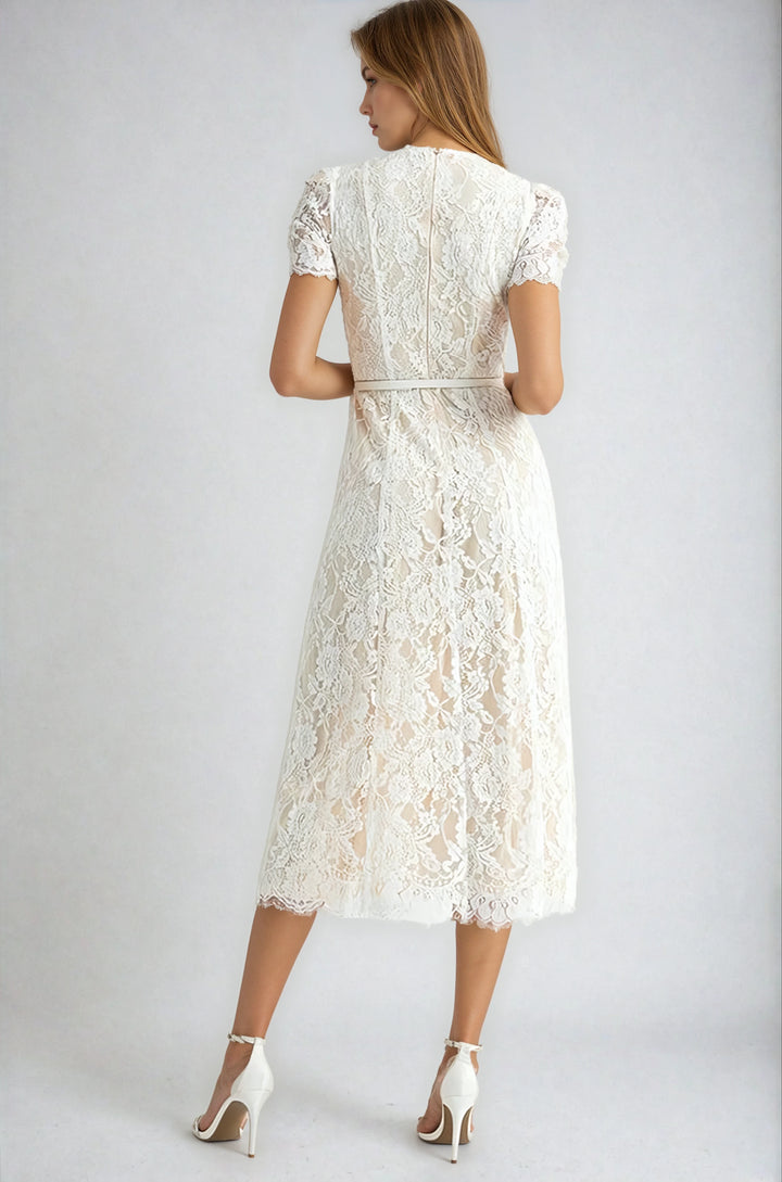Back view ivory lace dress with waist belt on model