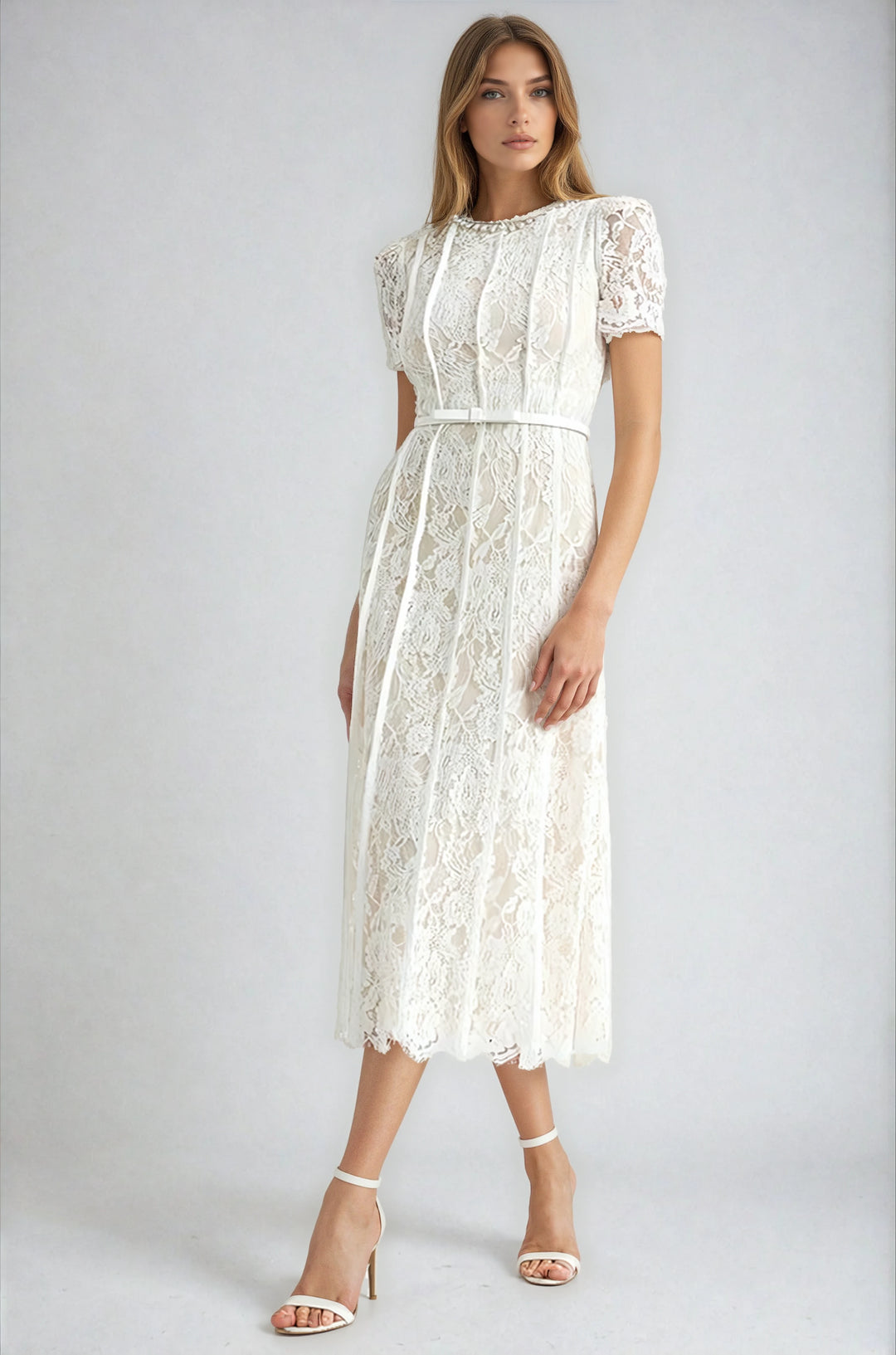 Ivory lace midi dress with floral detailing on model