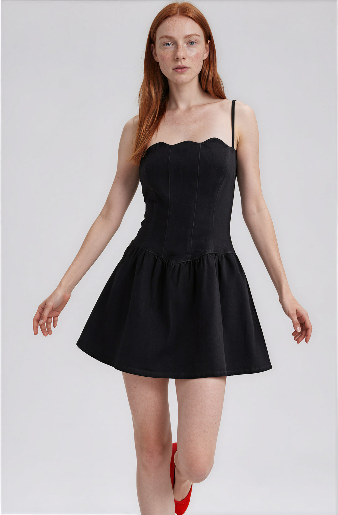 Front view dark denim flared mini dress on model