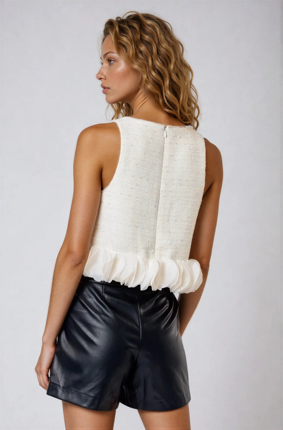 Back view off white structured swing top on model