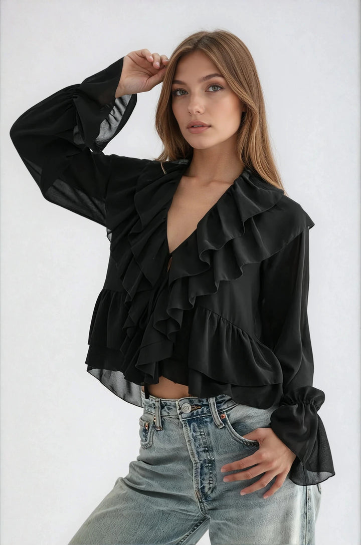 Front view black layered ruffle blouse on model