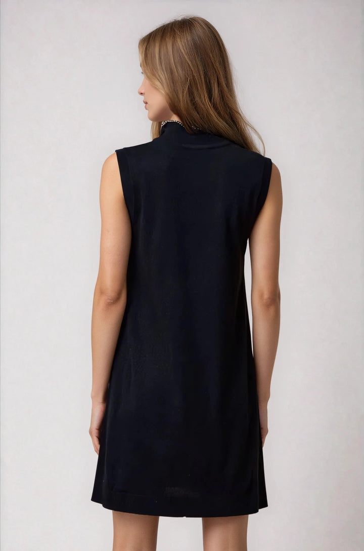 Back view black straight fit sweater dress on model