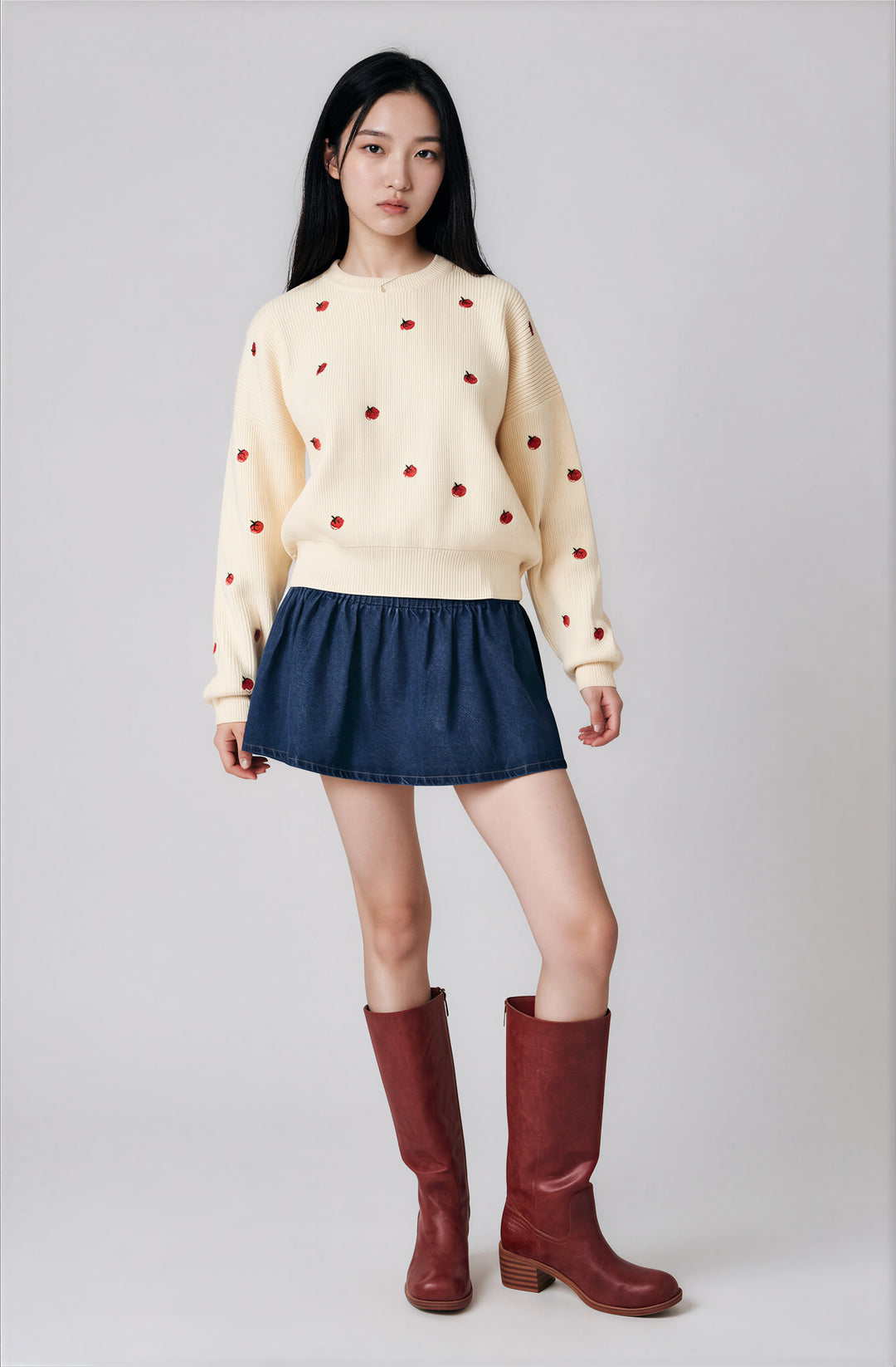 Front view cream tomato embroidered sweater on model