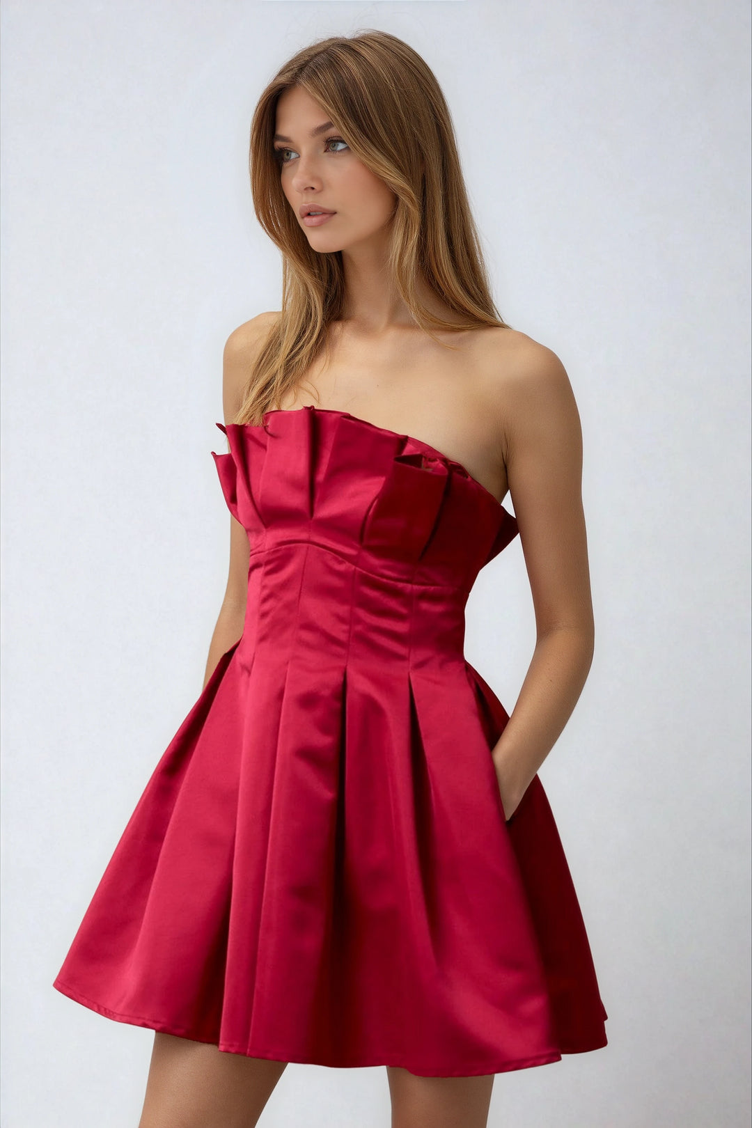 Front view wine pleated mini dress with sculptural bodice