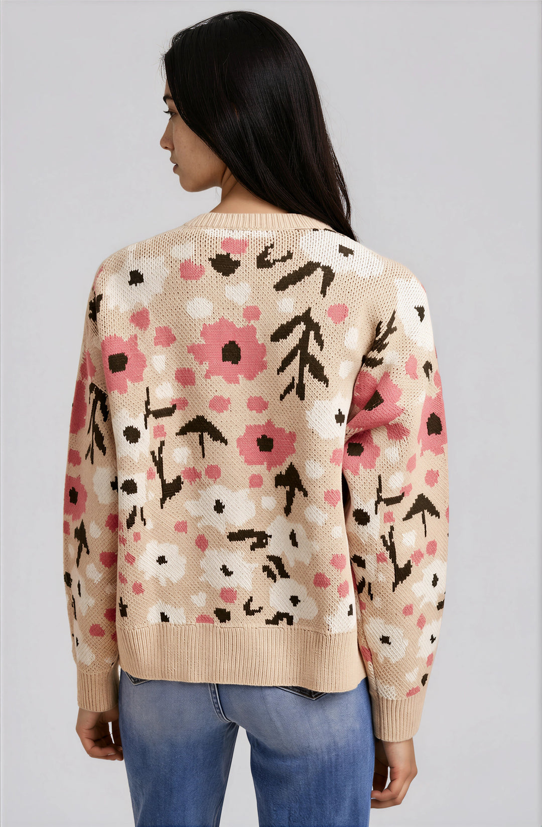 Back view beige floral knit cardigan on model